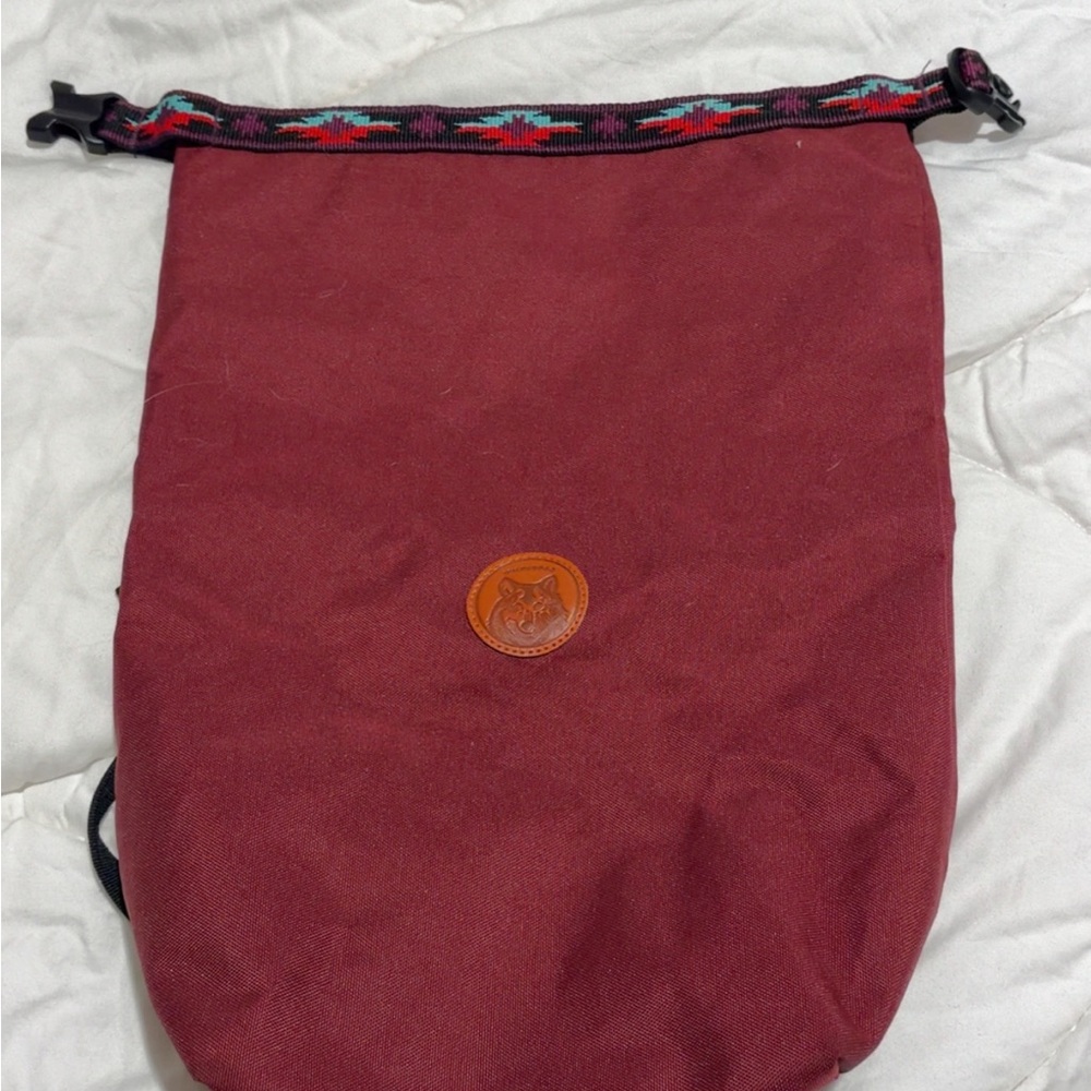 Red Roll-Top Backpack with Patterned Strap